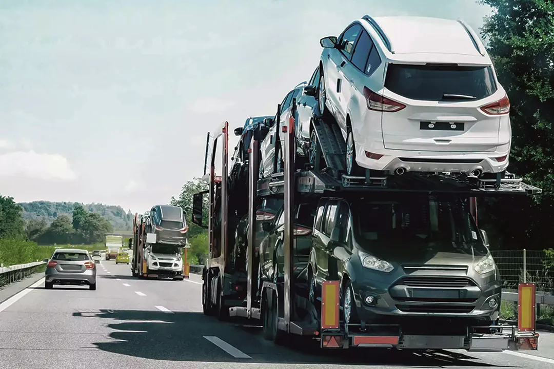 Auto transport carrier hauling vehicles